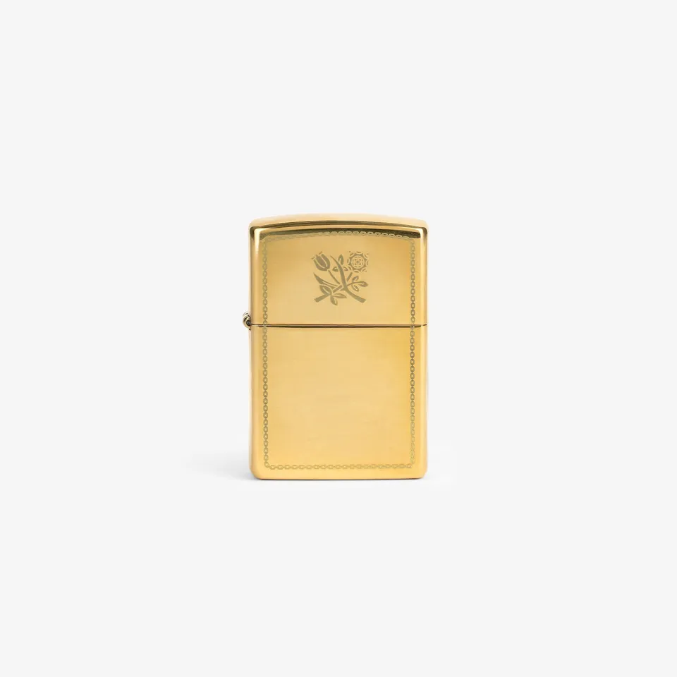 aim-leon-dore-graphic-zippo-lighter-gold image 1