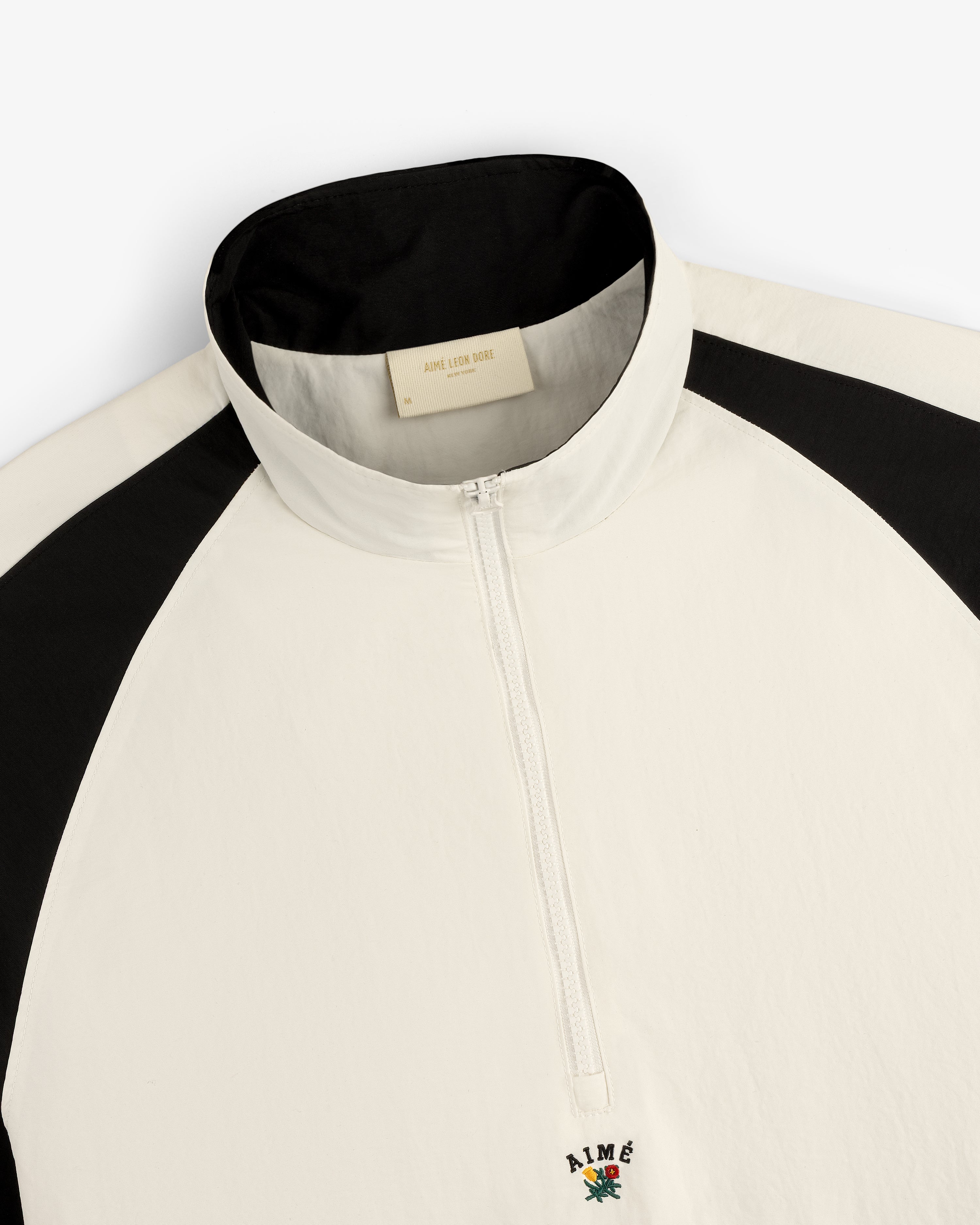aim-leon-dore-crest-nylon-half-zip-pullover-creme image 5