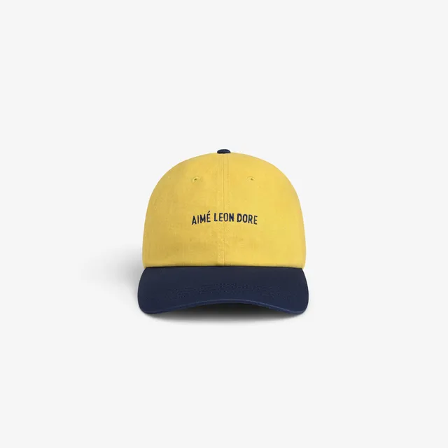aim-leon-dore-pigment-dyed-logo-cap-gelb-navy image 1
