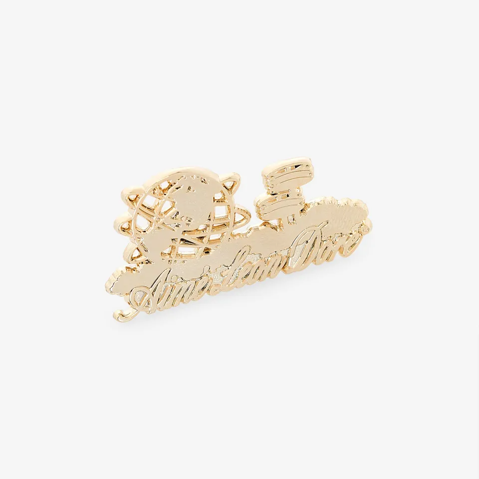 aim-leon-dore-ald-pin-goldfarbener-unisphere-messing-pin image 1