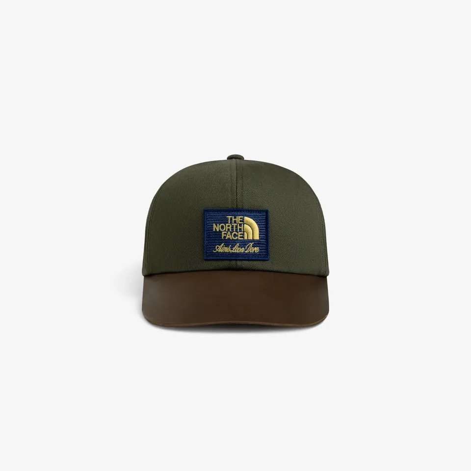 aim-leon-dore-x-the-north-face-leather-brim-logo-hat-5-panel-cap image 1