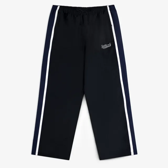 aim-leon-dore-colorblock-track-pant-trainingshose-schwarz-nylon image 1
