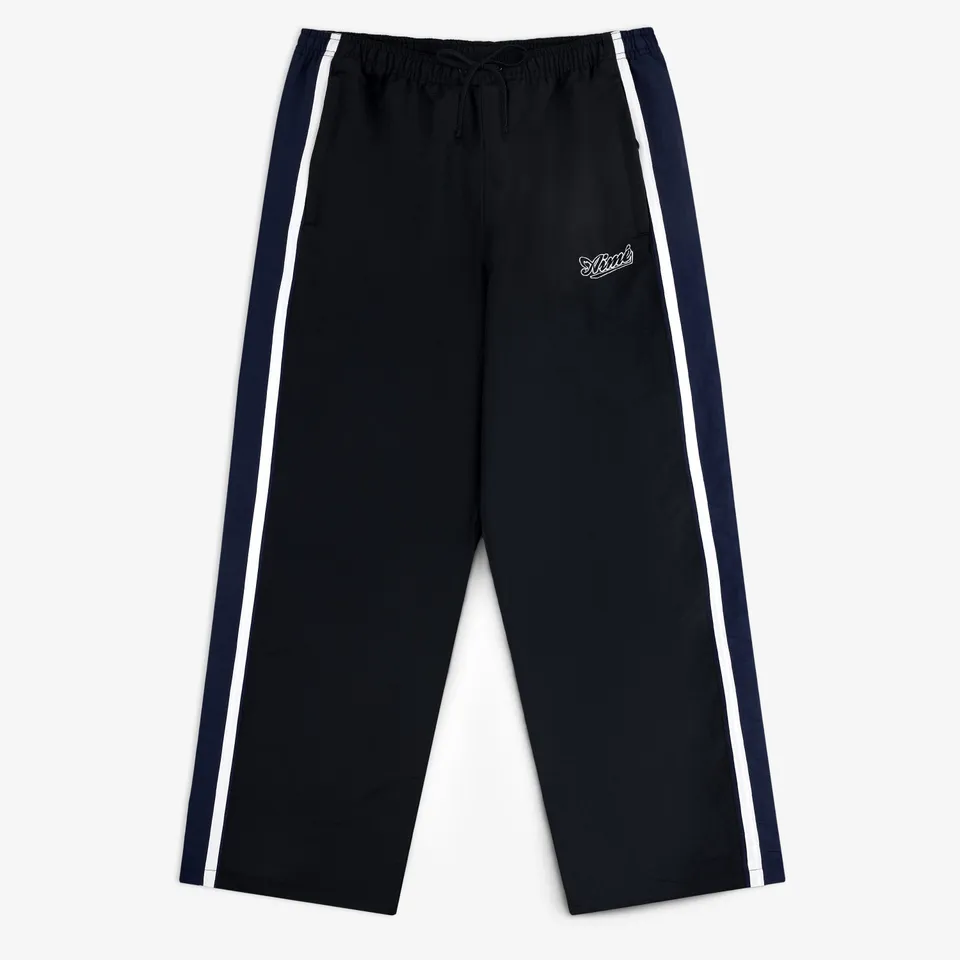 aim-leon-dore-colorblock-track-pant-trainingshose-schwarz-nylon image 1