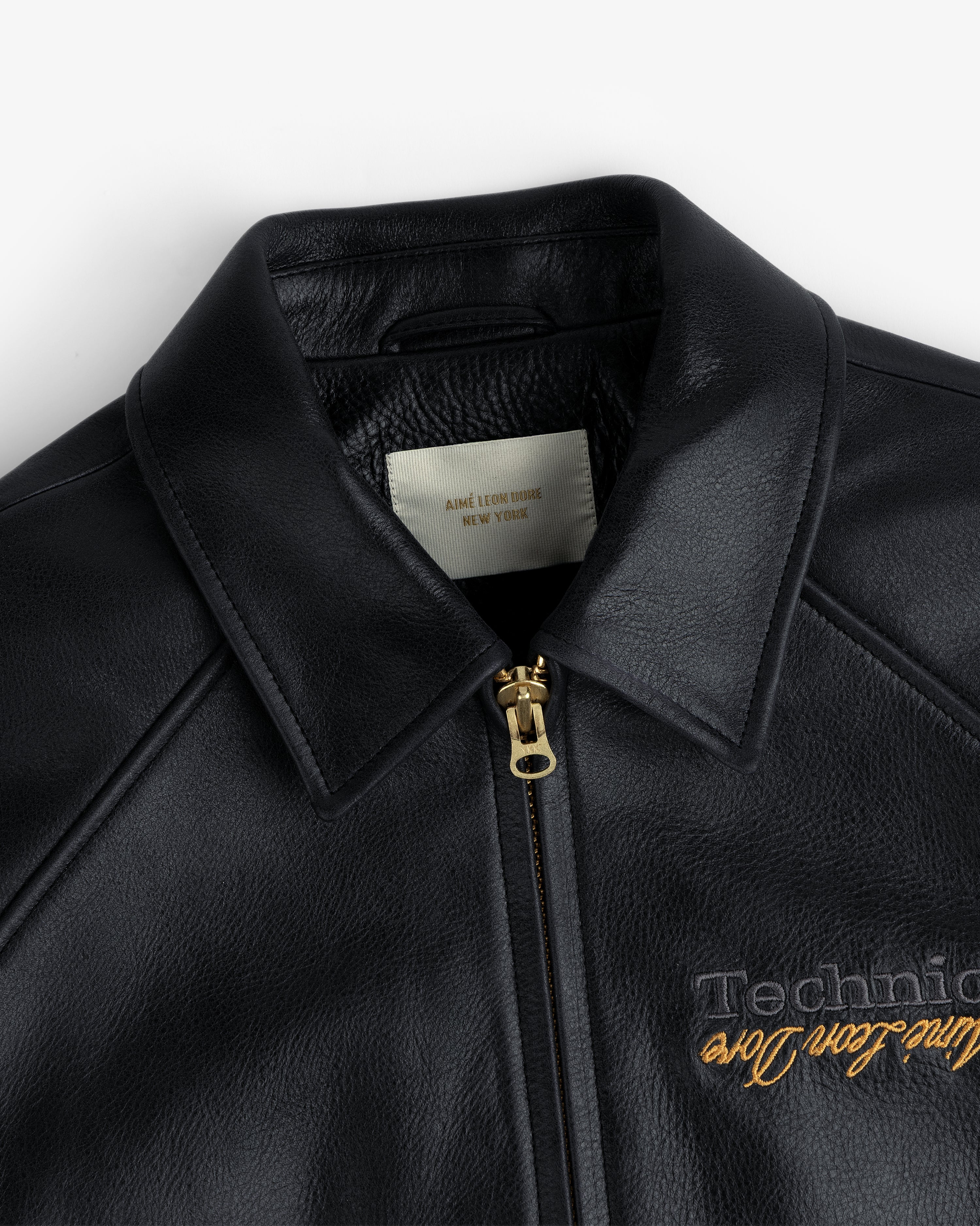 aim-leon-dore-x-technics-varsity-lederjacke-schwarz image 5