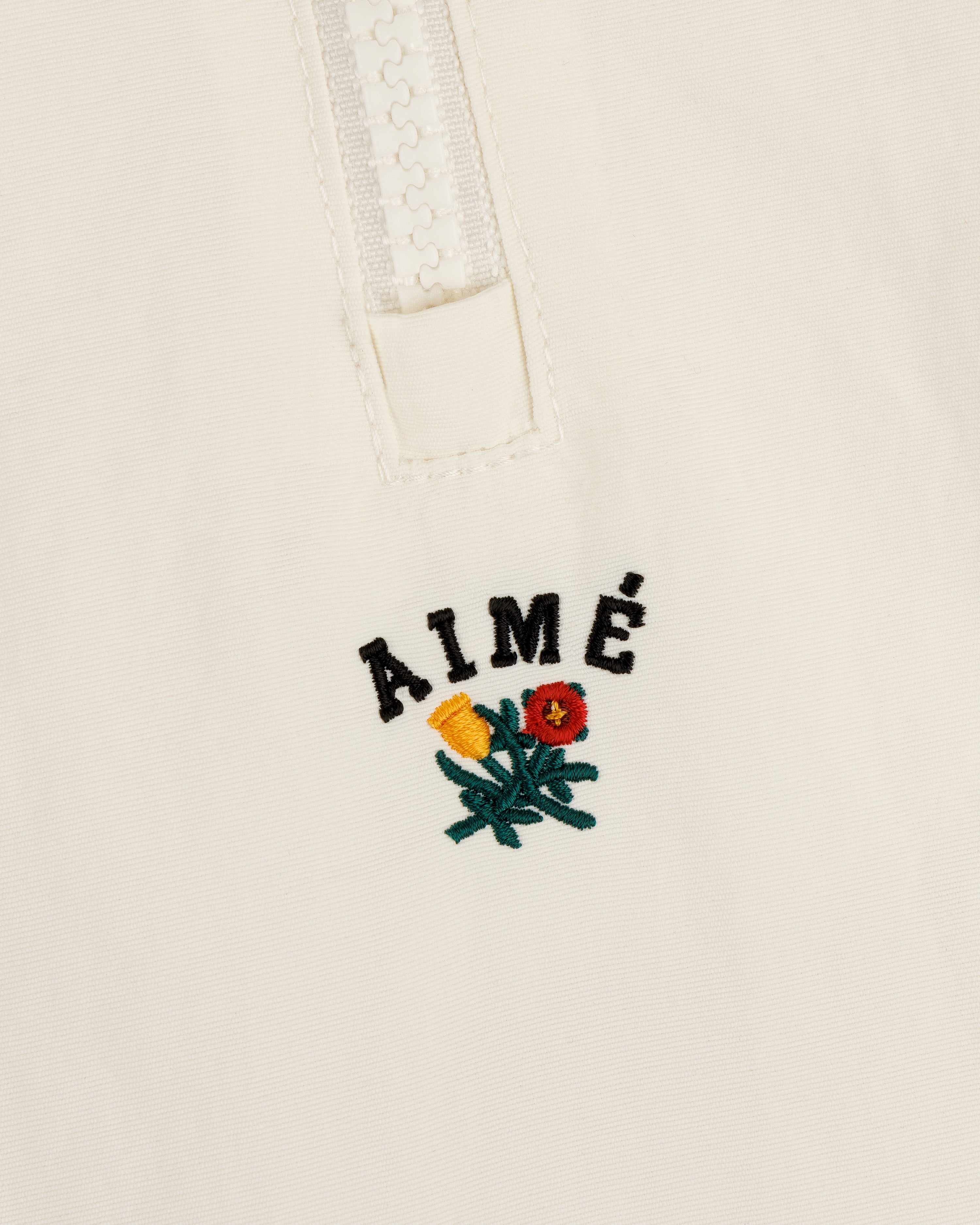 aim-leon-dore-crest-nylon-half-zip-pullover-creme image 6