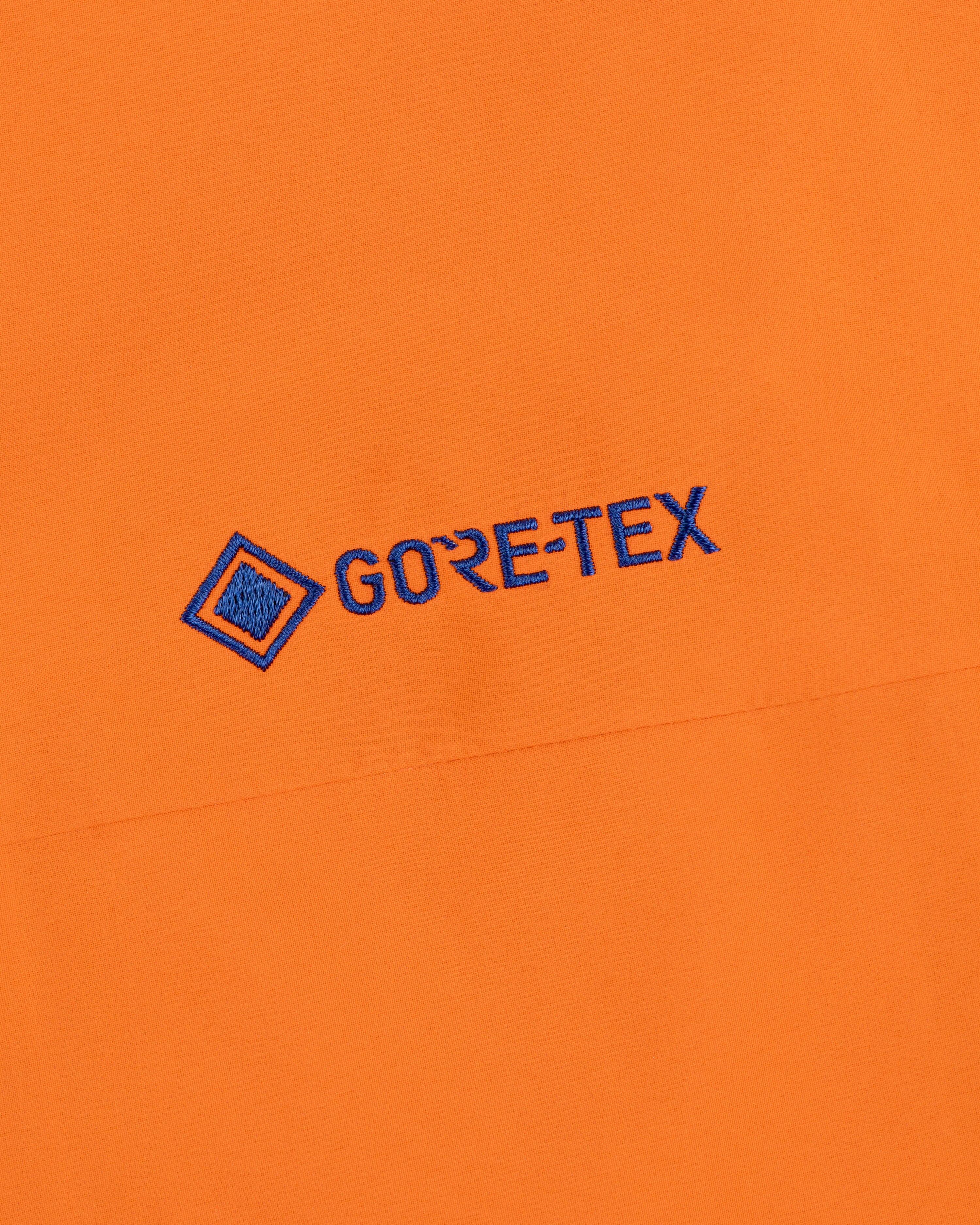 aim-leon-dore-mets-gore-tex-rain-delay-jacket-orange image 7