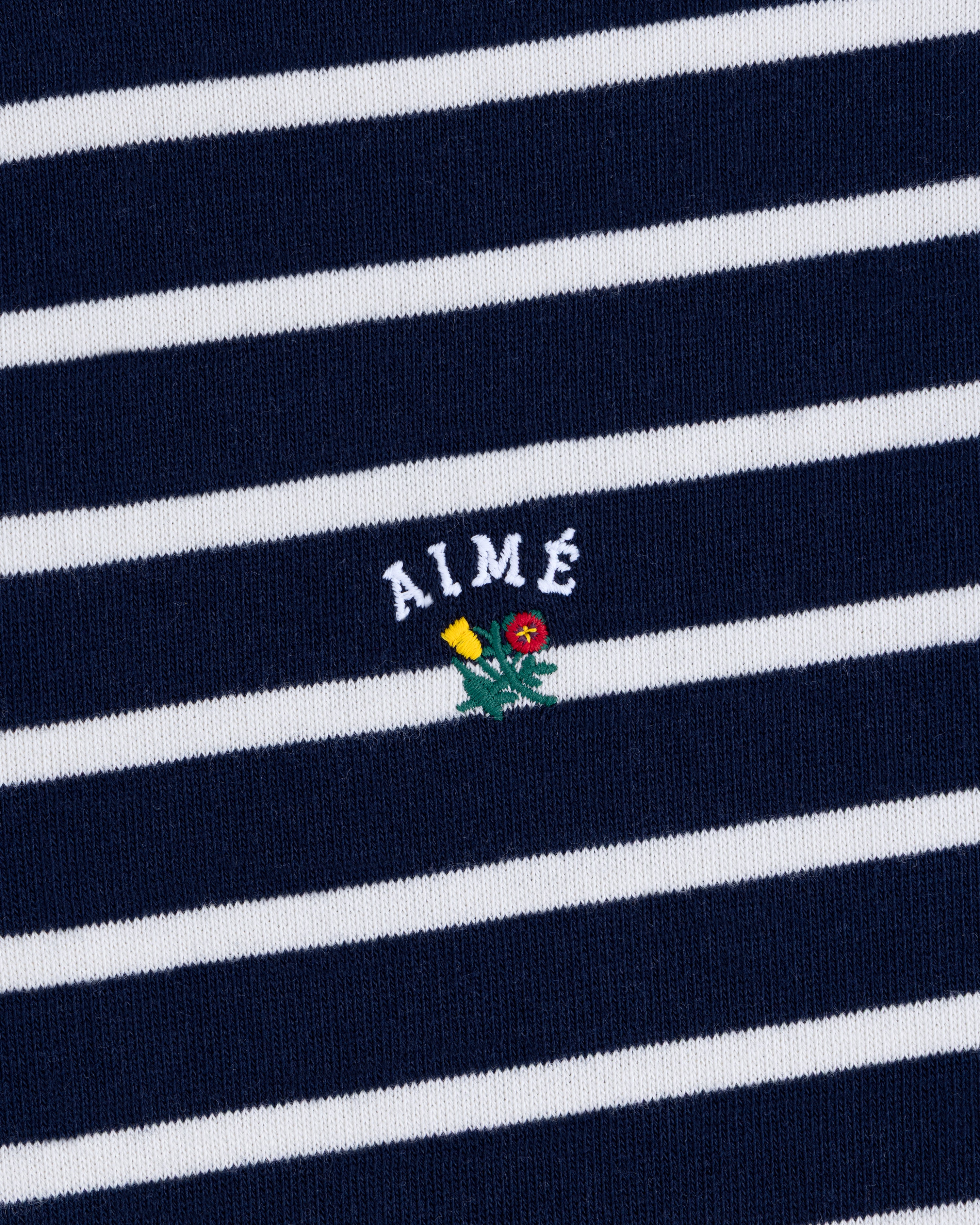aim-leon-dore-striped-crest-quarter-zip-navy-cream image 5