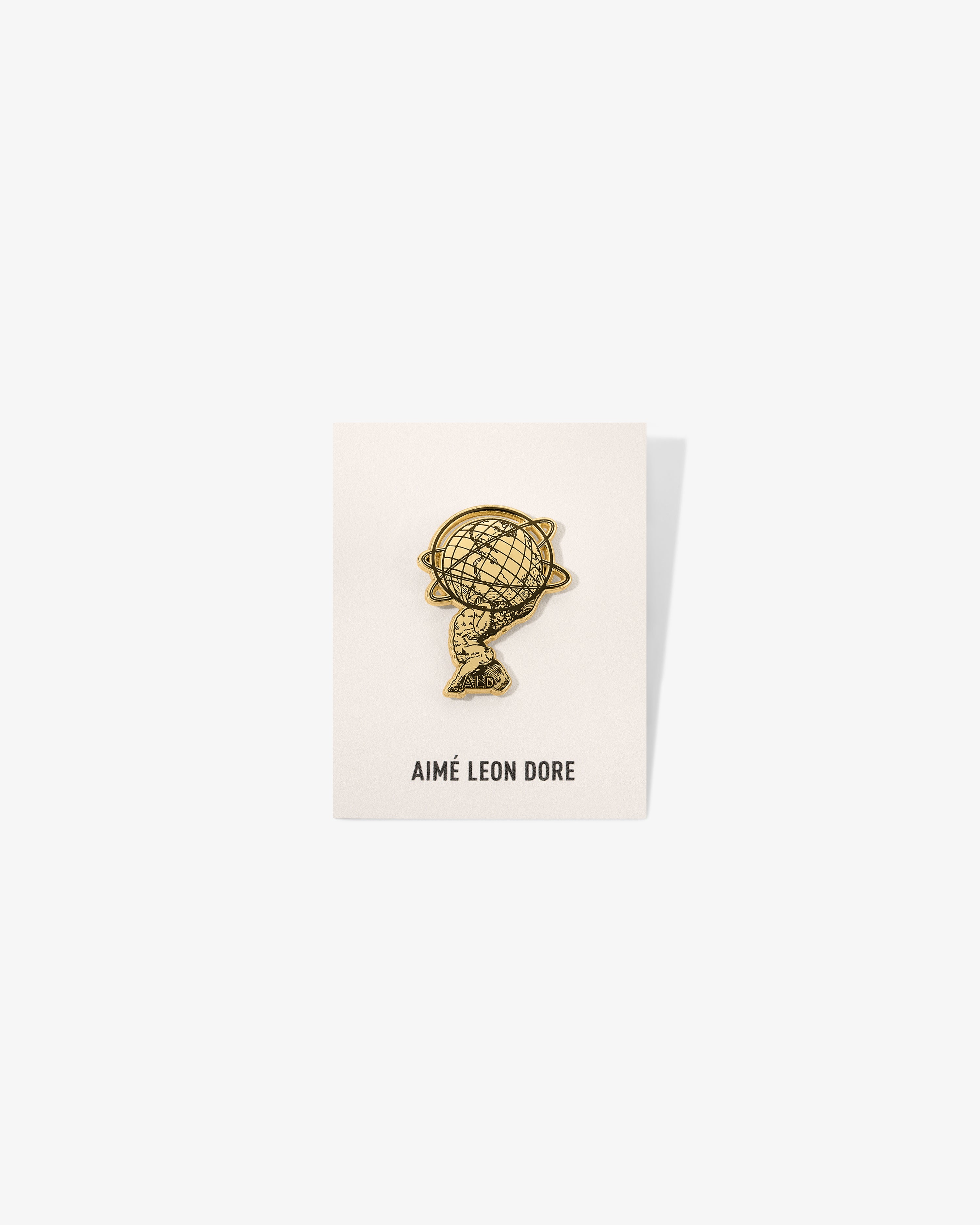 aim-leon-dore-graphic-pin-anstecker-gold-schwarz image 4