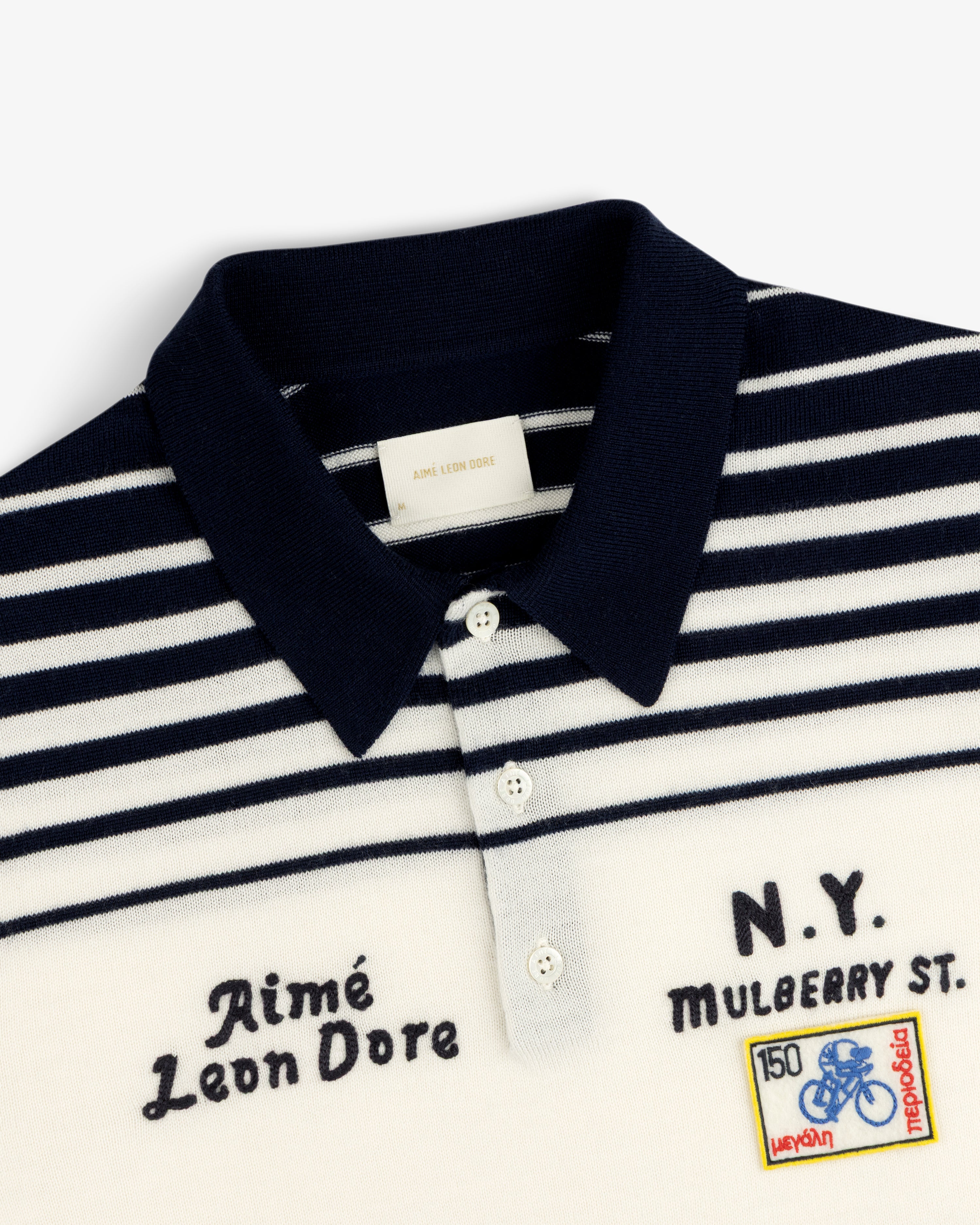 aim-leon-dore-merino-wool-knit-cycling-polo-creme-navy image 3