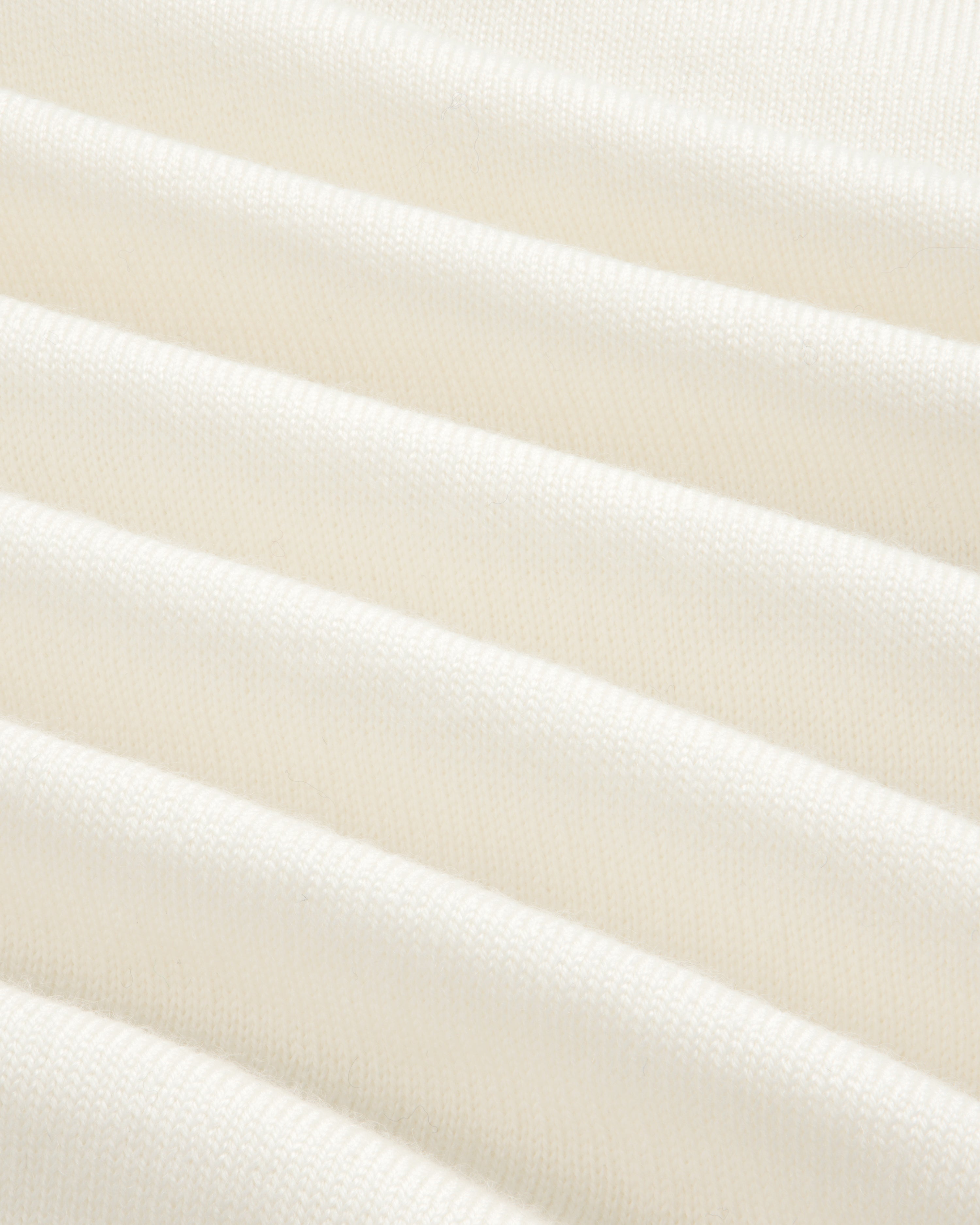 aim-leon-dore-merino-wool-knit-cycling-polo-creme-navy image 4