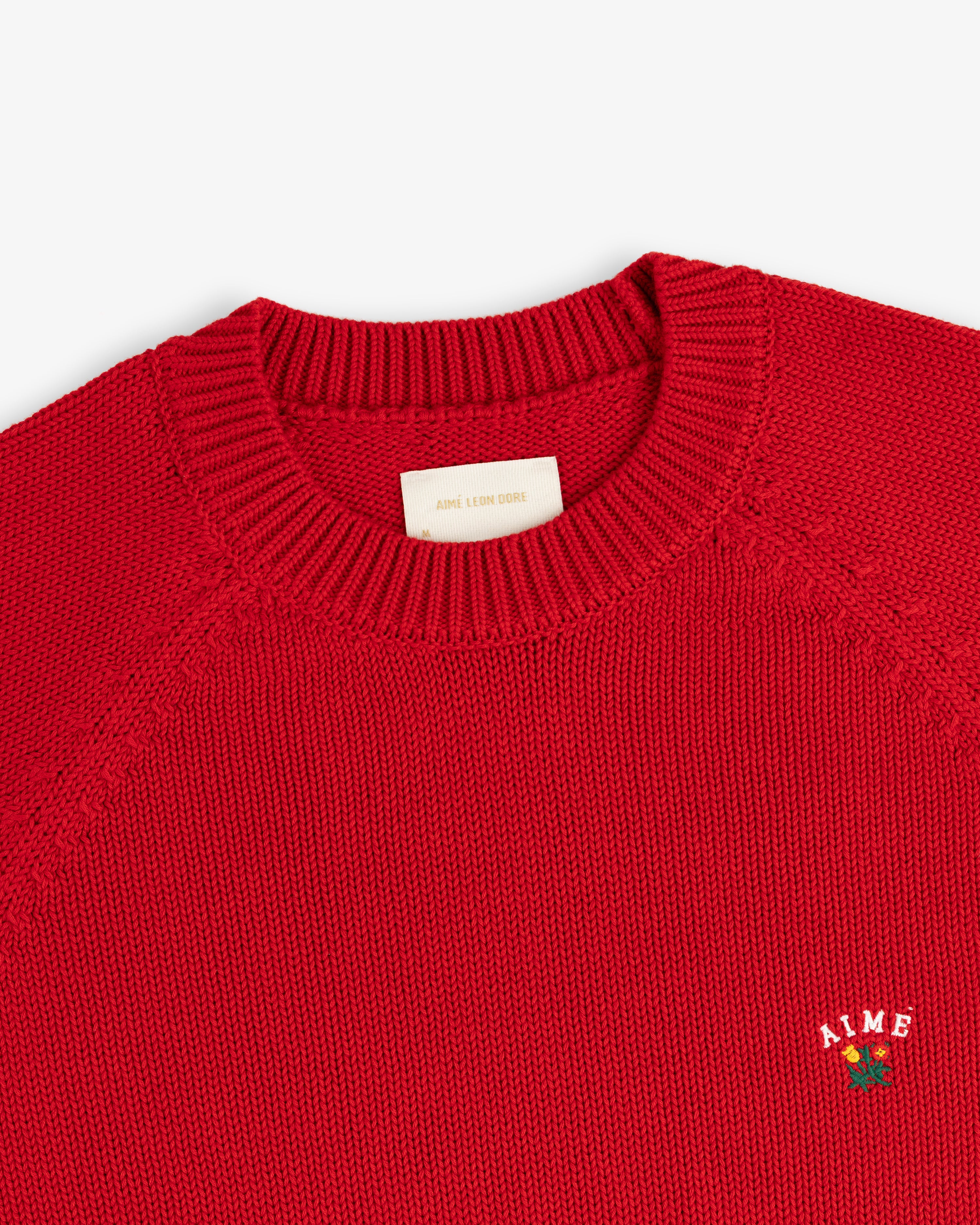 aim-leon-dore-crest-raglan-sweater-rot-baumwoll-strickpullover image 4