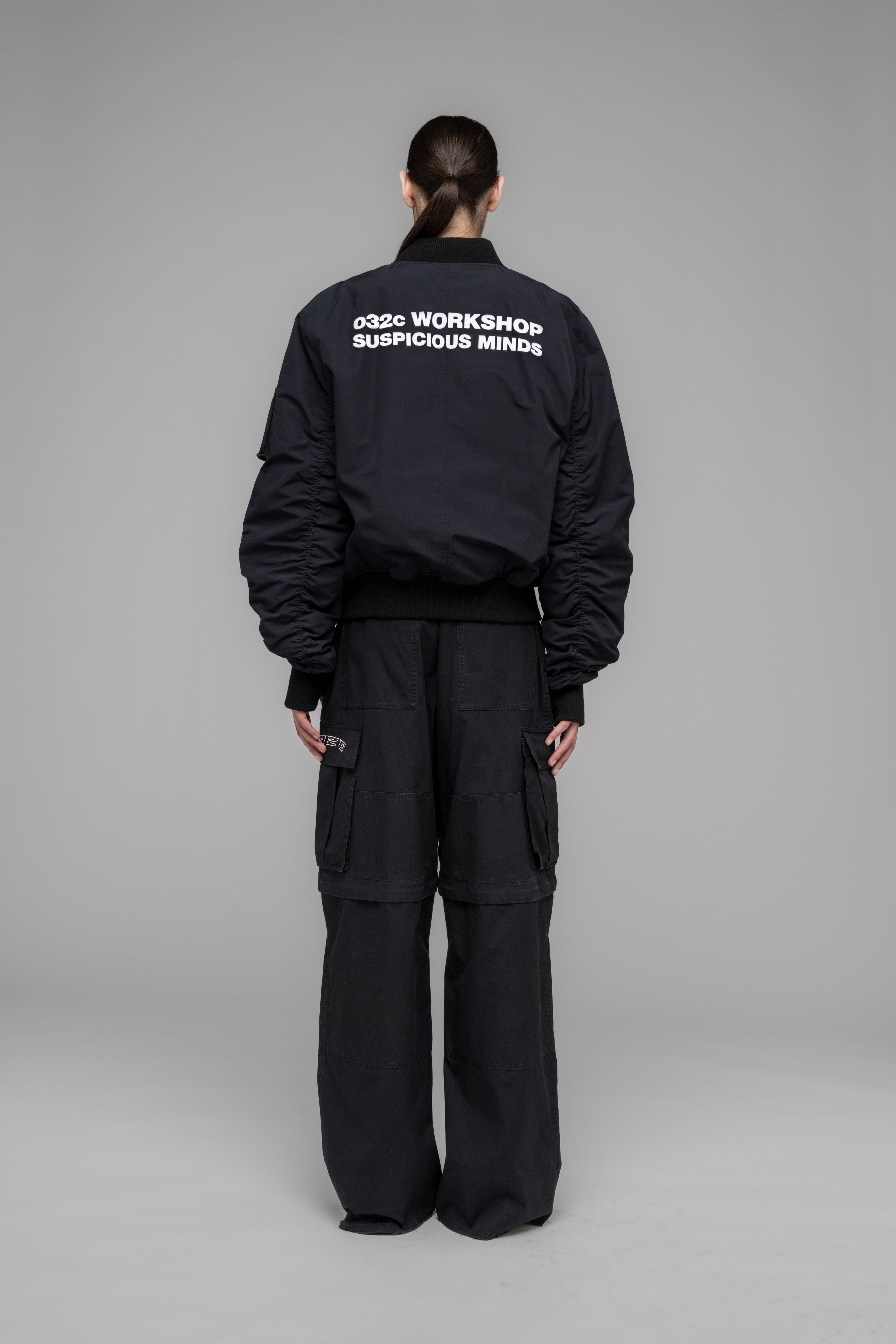 032c-suspicious-minds-bomberjacke-schwarz-mit-backprint image 1