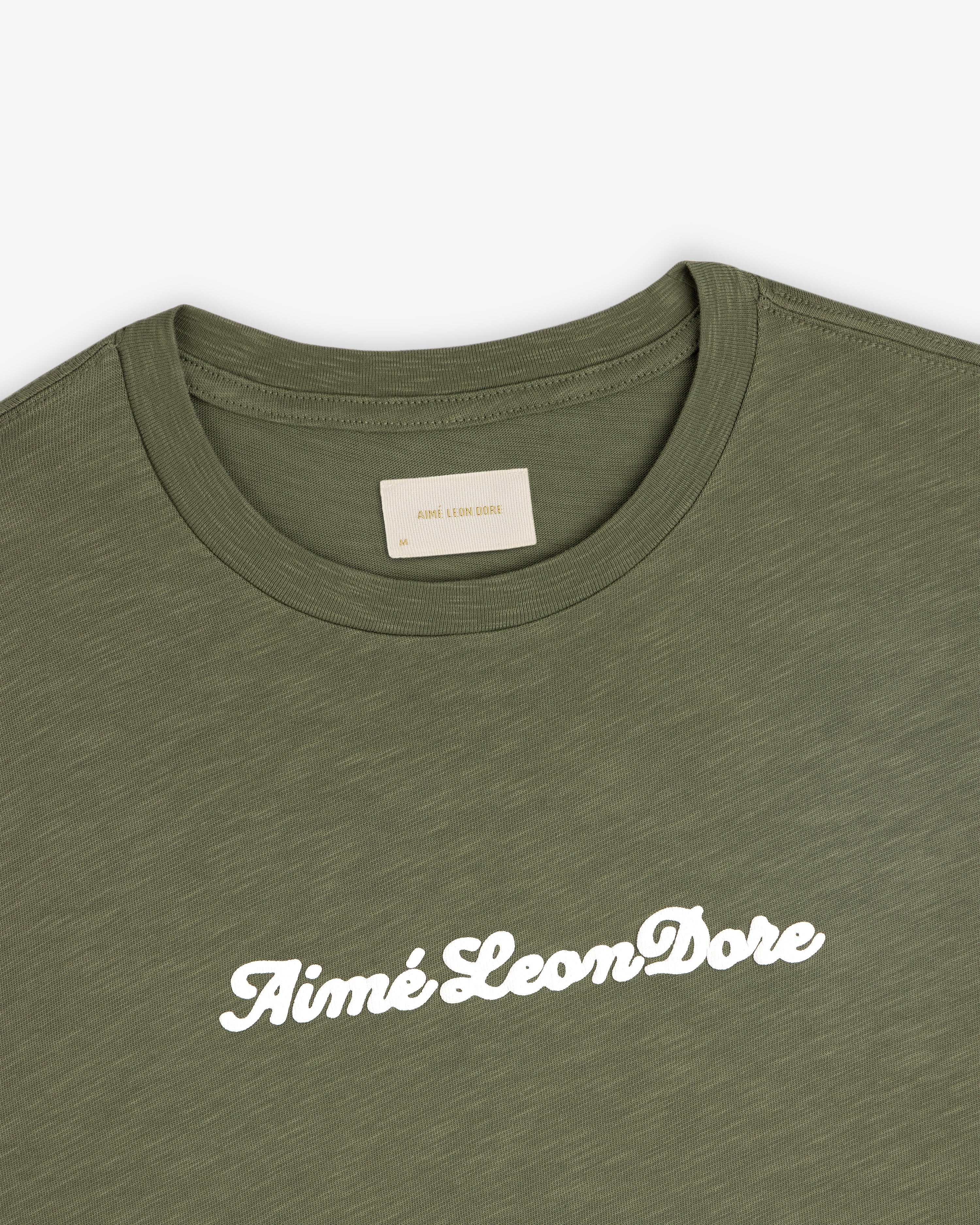 aim-leon-dore-puff-print-slub-logo-tee-t-shirt-gr-n image 3
