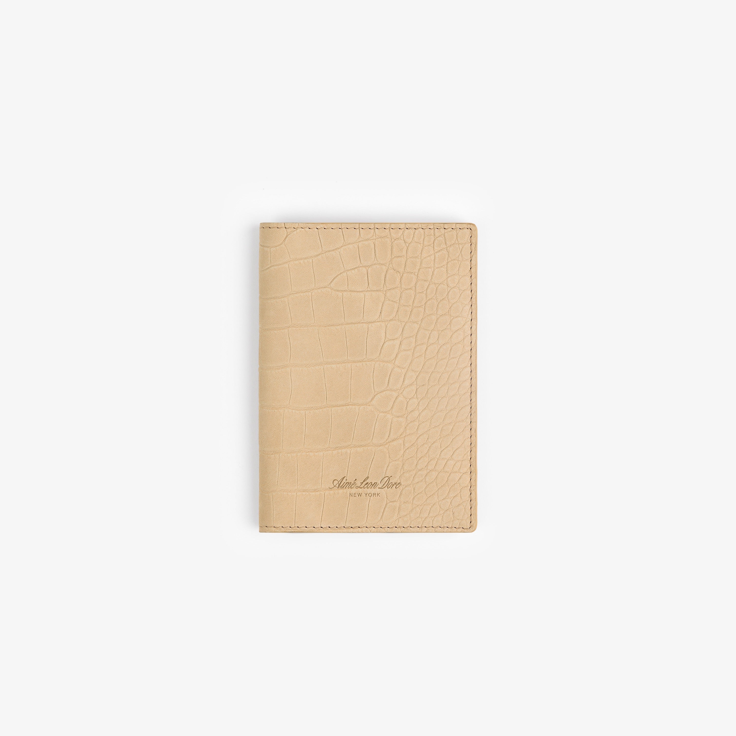aim-leon-dore-croc-embossed-nubuck-passport-holder-tan image 1