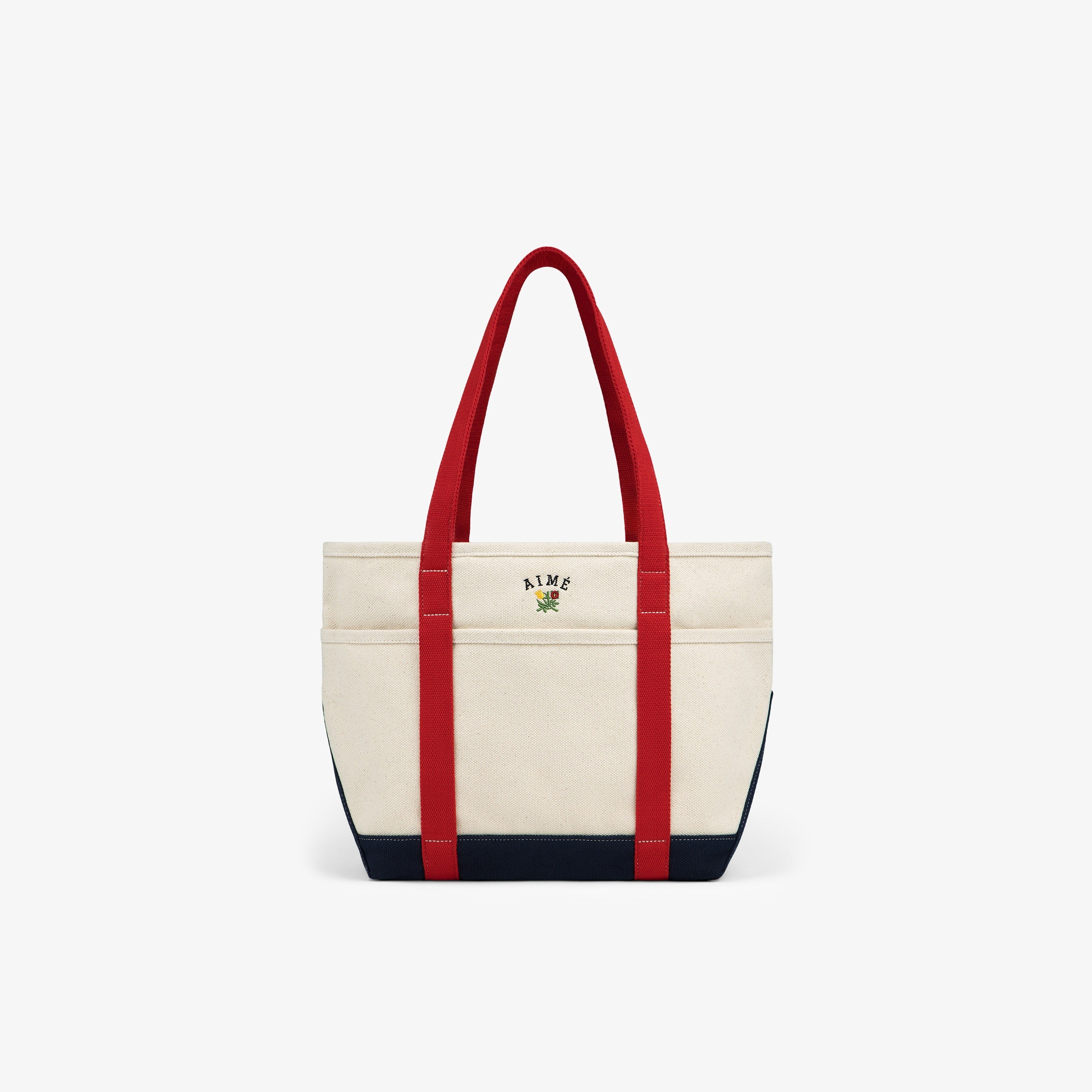aim-leon-dore-small-crest-contrast-tote-bag-canvas-tote-in-cream-rot-navy image 1