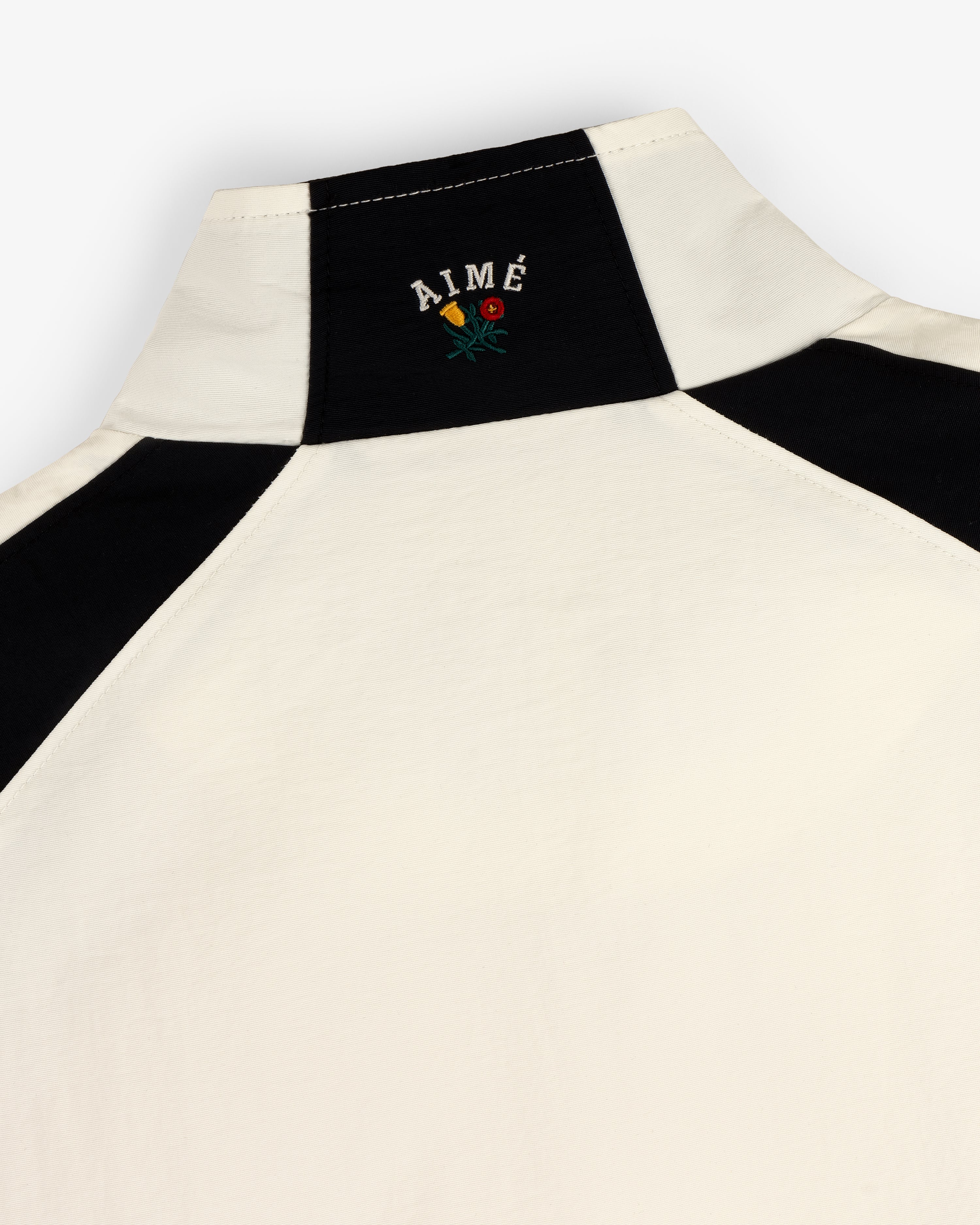 aim-leon-dore-crest-nylon-half-zip-pullover-creme image 7