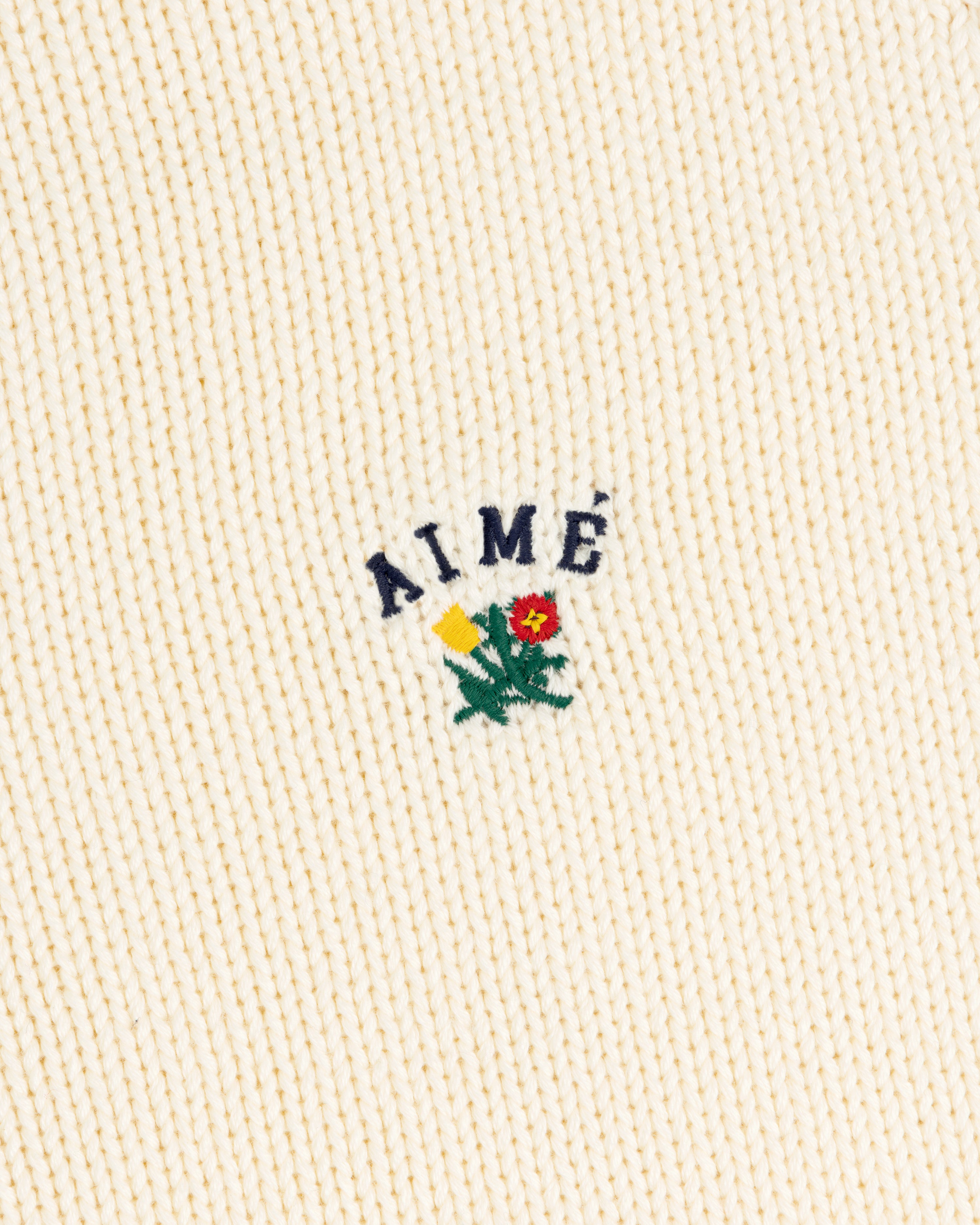 aim-leon-dore-crest-raglan-sweater-creme-strickpullover-baumwolle image 5