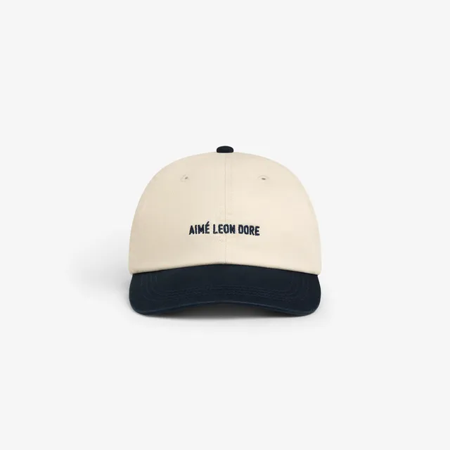 aim-leon-dore-washed-chino-cap-navy-cream-strapback image 1